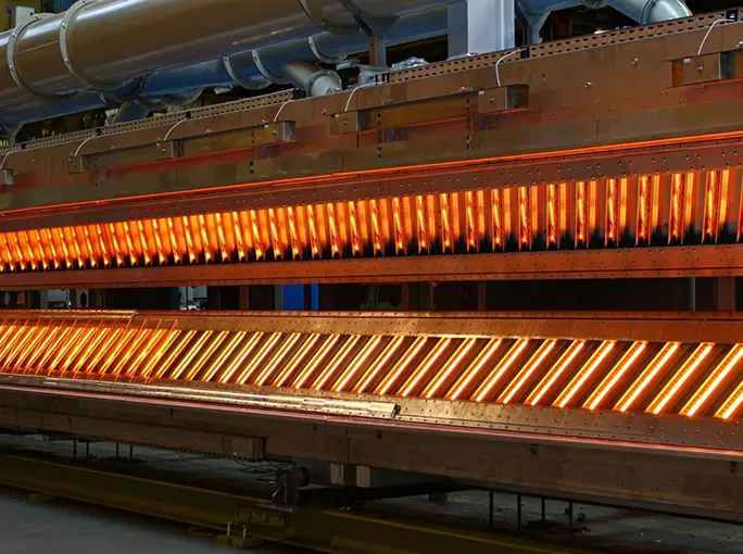 Industrial infrared drying system with multiple glowing heating elements.