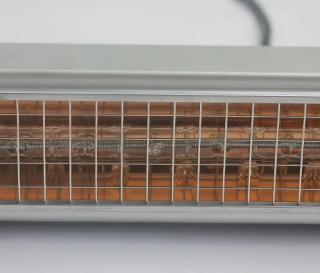 Close-up of infrared drying unit with orange light